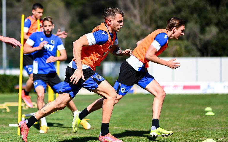 Samp back in training in two groups